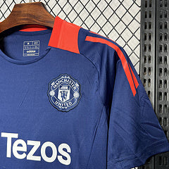 CAMISETA MANCHESTER UNITED PRE-JUEGO AZUL (HOMBRE)